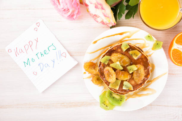 istock Homemade breakfast on a wooden white table. 939576624