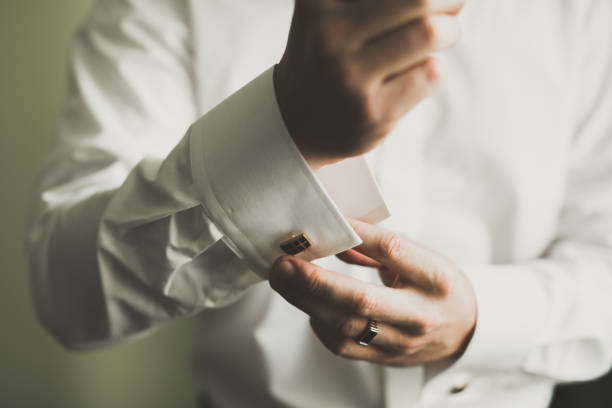 istock Beautiful man, groom posing and preparing for wedding 939578234