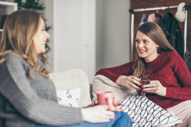 istock Two college girls relaxing 939578824