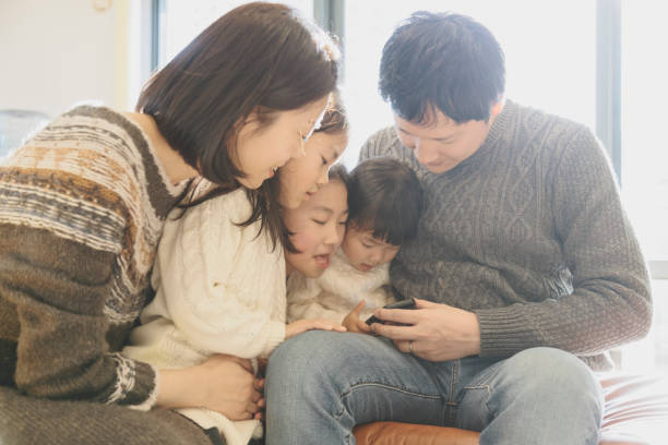istock Family relaxed at home 939579556