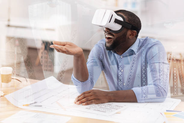 istock Positive African American with virtual mask on his head 939579610