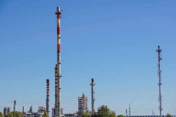 istock Industrial power plant with blue sky background 939586924