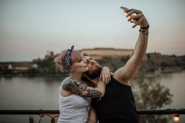 istock Couple in love taking selfie 939589340