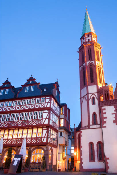 istock Restaurant and Old Nikolai Church at Romerberg square 939589916