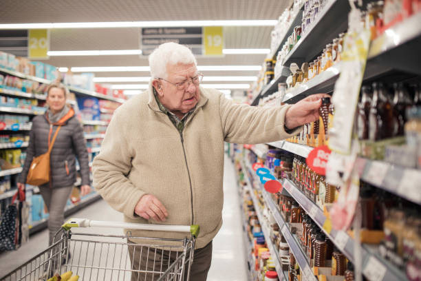 istock Senior Man Shopping for Groceries 939594348