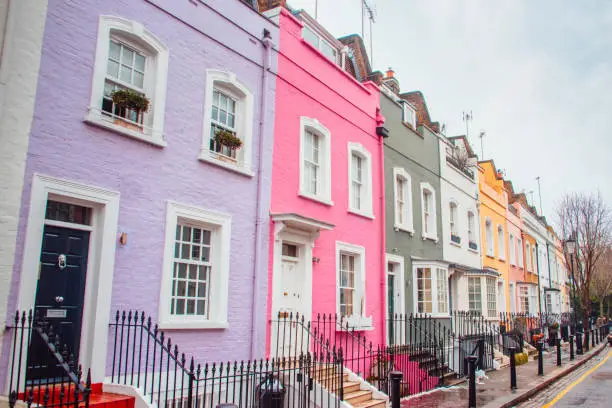 A colorful street in London with houses in a row