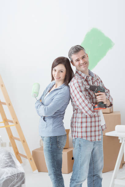 istock Couple doing home renovations 939598130