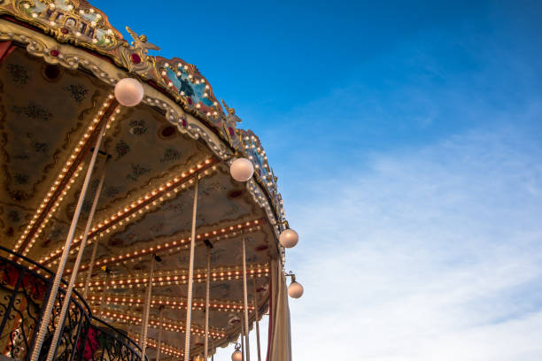 istock French carousel orleans against blue sky 939598216