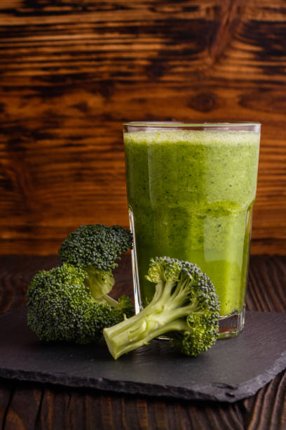 istock fresh broccoli juice on a wooden background 939601170
