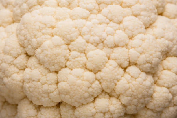 istock fresh cauliflower on a rustic wooden background 939601790