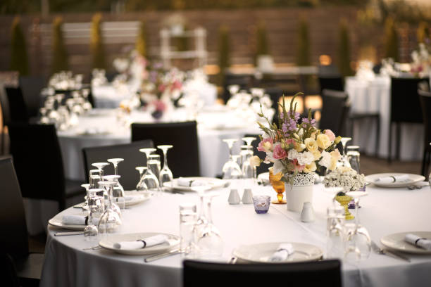 istock Formal dinner service at a outdoor wedding banquet 939601900