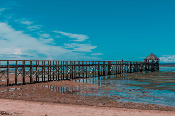 istock Bridge in the midddle of the sea 939605004