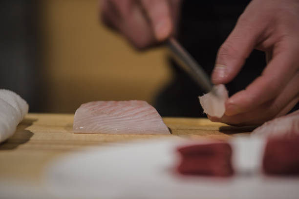 istock Handwork Slicing Fresh sea food, making sashimi 939609540