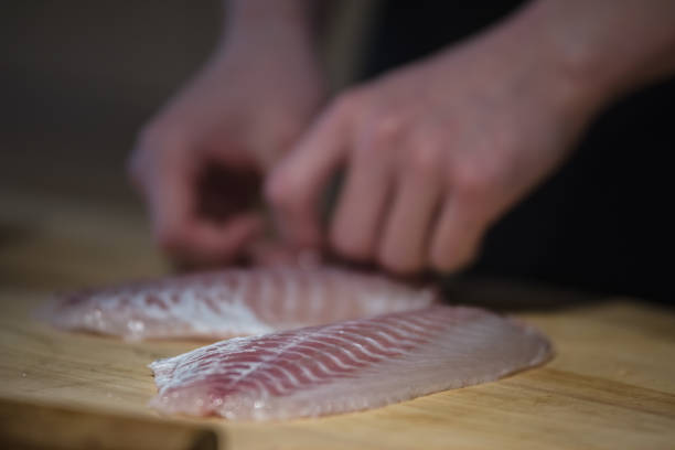 istock Handwork Slicing Fresh sea food, making sashimi 939609568