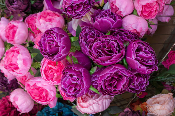 istock Plastic fake flowers colourful flowers 939610344