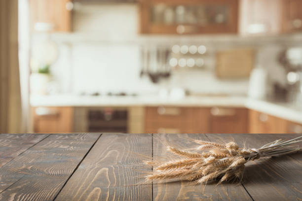 istock Blurred background. Modern kitchen with tabletop and space for you. 939615992