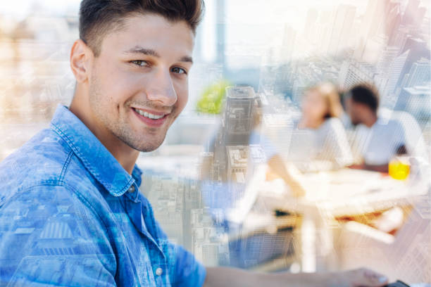 istock Portrait of handsome student that being in cafe 939616634