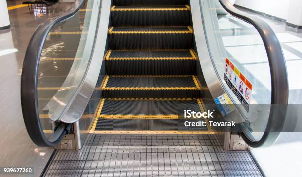 Close Up Modern Escalator In Shopping Center Moving Up Staircase Stock Photo - Download Image Now