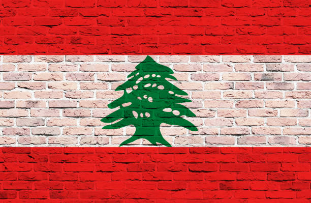 istock Lebanon flag painted over brick wall 939638238