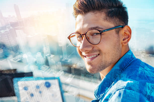istock Good-looking happy young man smiling 939638600