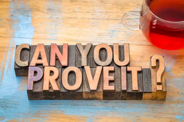 Can you prove it? A question in vintage letterpress wood type with a cup of tea..