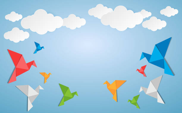 istock Paper Origami bird made colorful art style with clouds. 939638828