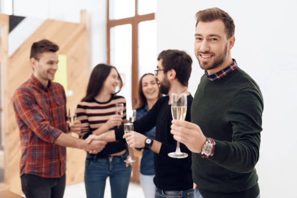 istock A group of young office workers celebrating. 939644040