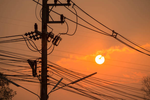 istock Shadow the electric poles and power lines. 939653216