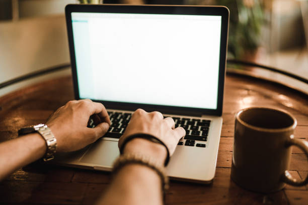 istock Man working with laptop in cafe 939653572