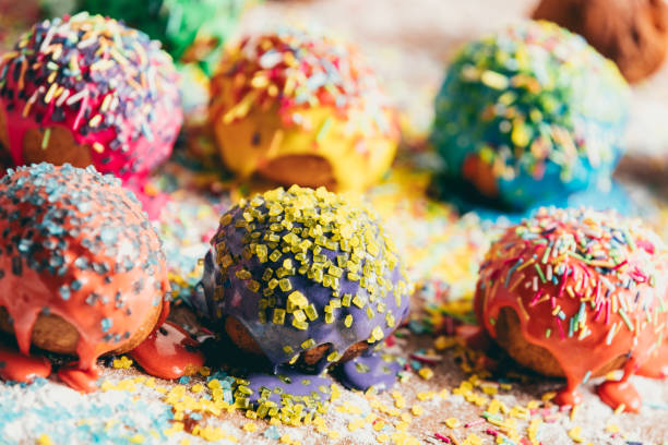 istock Sprinkled donuts laying on a messy counter 939658800