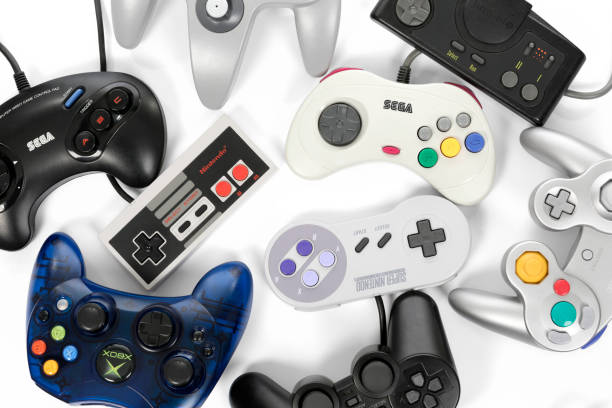 レトロなゲームのコント ローラー - joystick game controller playstation sony ストックフォトと画像