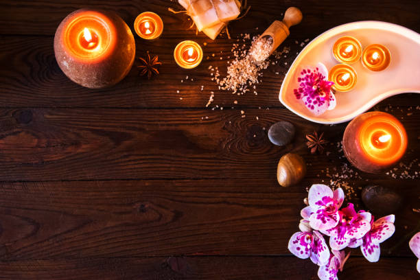 istock Spa concept with chocolate and candles on a wooden background. 939659646