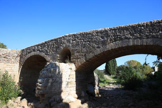 istock Old roman bridge at Pollensa. Mallorca. Spain 939660056