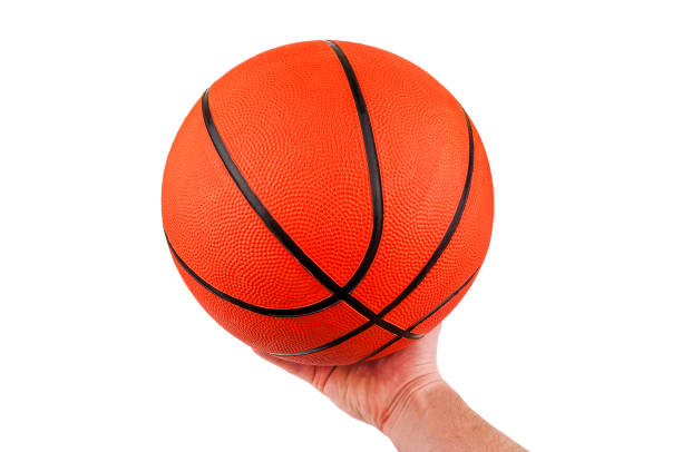 istock basketball ball in hand 939675222