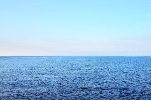 Colorful purple sunset over blue open Baltic sea