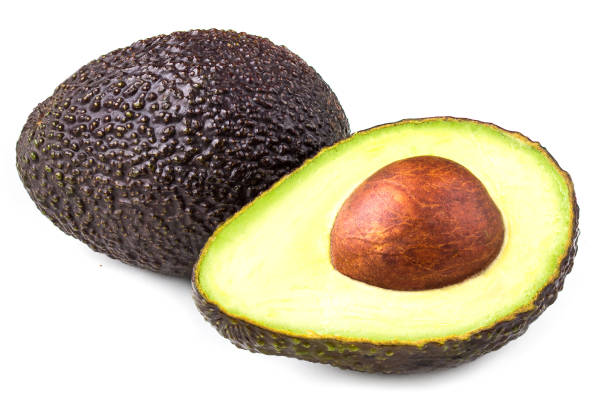 アボカドは、白い背景で隔離。黒アボカド ハースすぐ最大製品パッケージ デザイン要素の使用します。 - avocado brown close up dieting ストックフォトと画像