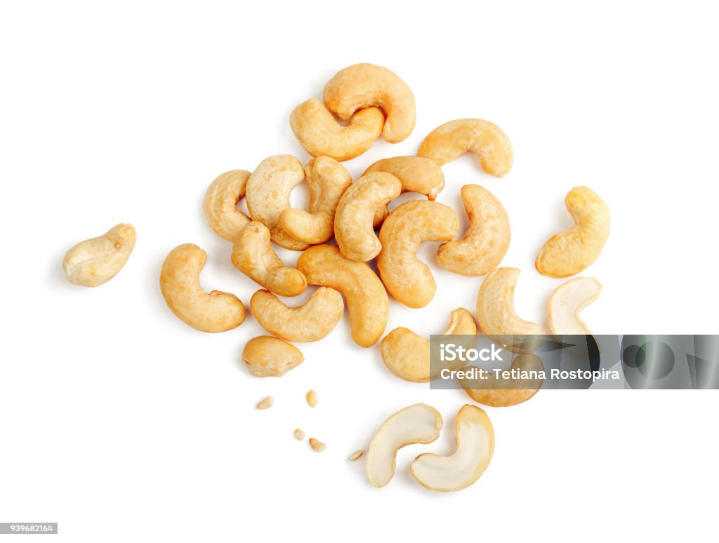 Сashew nuts heap isolated on white background Сashew nuts heap isolated on white background. Top view. Cashew Stock Photo