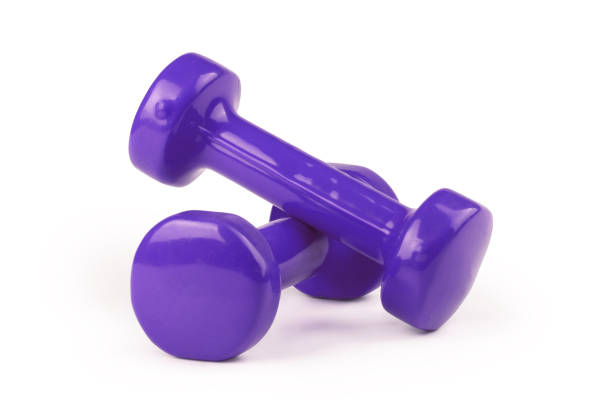Two purple dumbbells isolated on white background