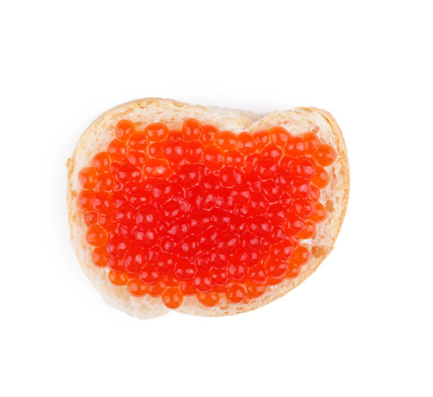 istock Sandwich with red caviar isolated on white background 939688254