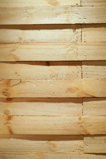Wooden wall with shade of shadow for background.