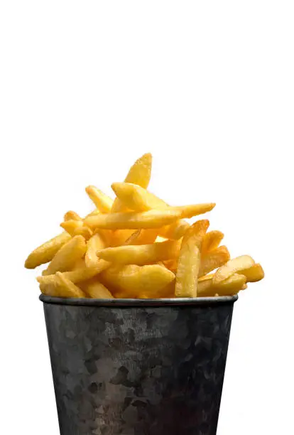 Photo of French fries in a metal pail on a white background