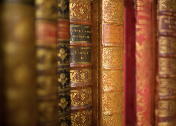 istock Old leather bound books with a shallow depth of field 939715210