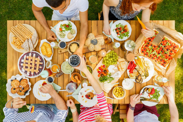 istock High angle of eating people 939722238