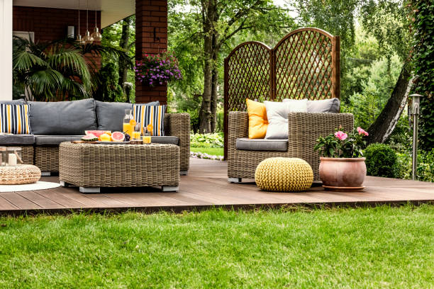 istock Pink flowers on wooden terrace 939732396