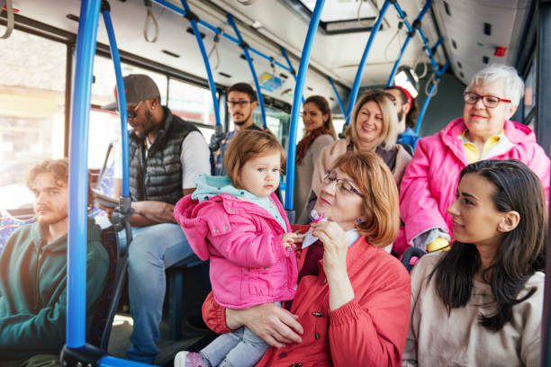 istock Three generation family traveling by public bus 939743128
