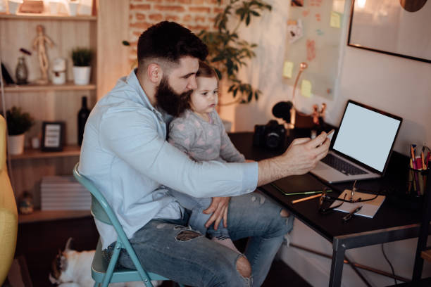 istock Baby girl and her dad taking selfie 939751022