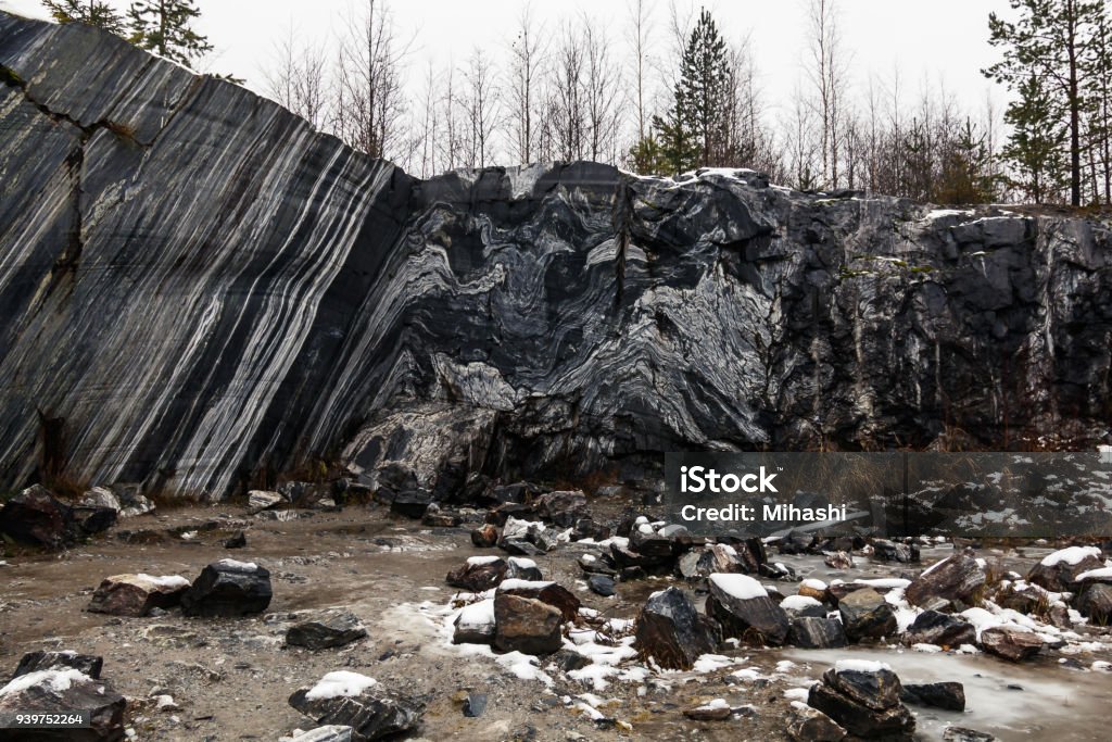 Italian marble quarry Ruskeala In this part of the quarry Ruskeala marble mining was conducted in an open way, Karelia, Russia Quarry Stock Photo