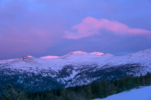 istock pink sunrise over the Ural Mountains 939762380