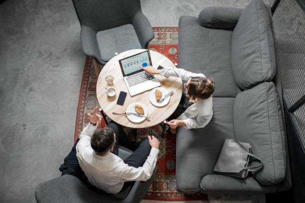 istock Business couple at the cafe 939770718