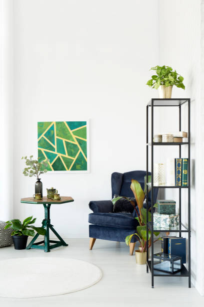 istock Modern room with emerald armchair 939770974